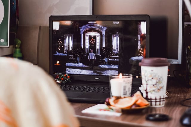 a movie playing on a laptop